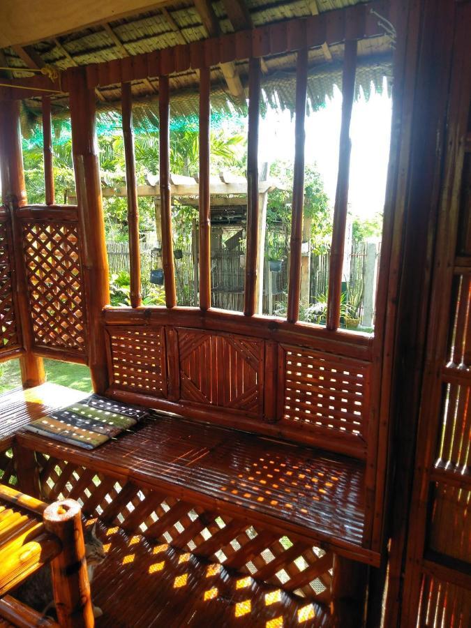 Titanic'S Nipa Hut Hostel Moalboal Luaran gambar