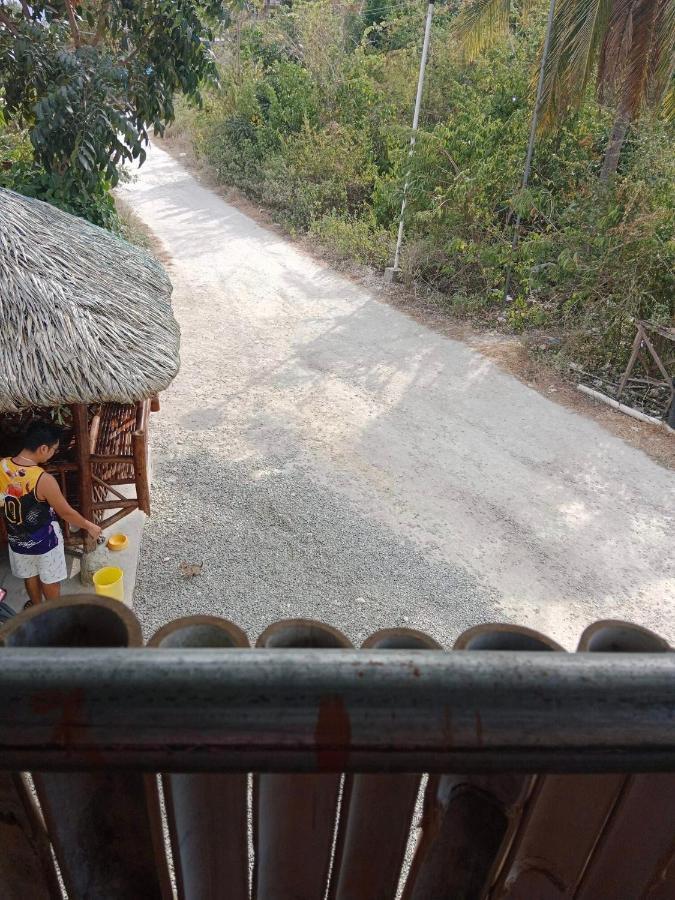 Titanic'S Nipa Hut Hostel Moalboal Luaran gambar